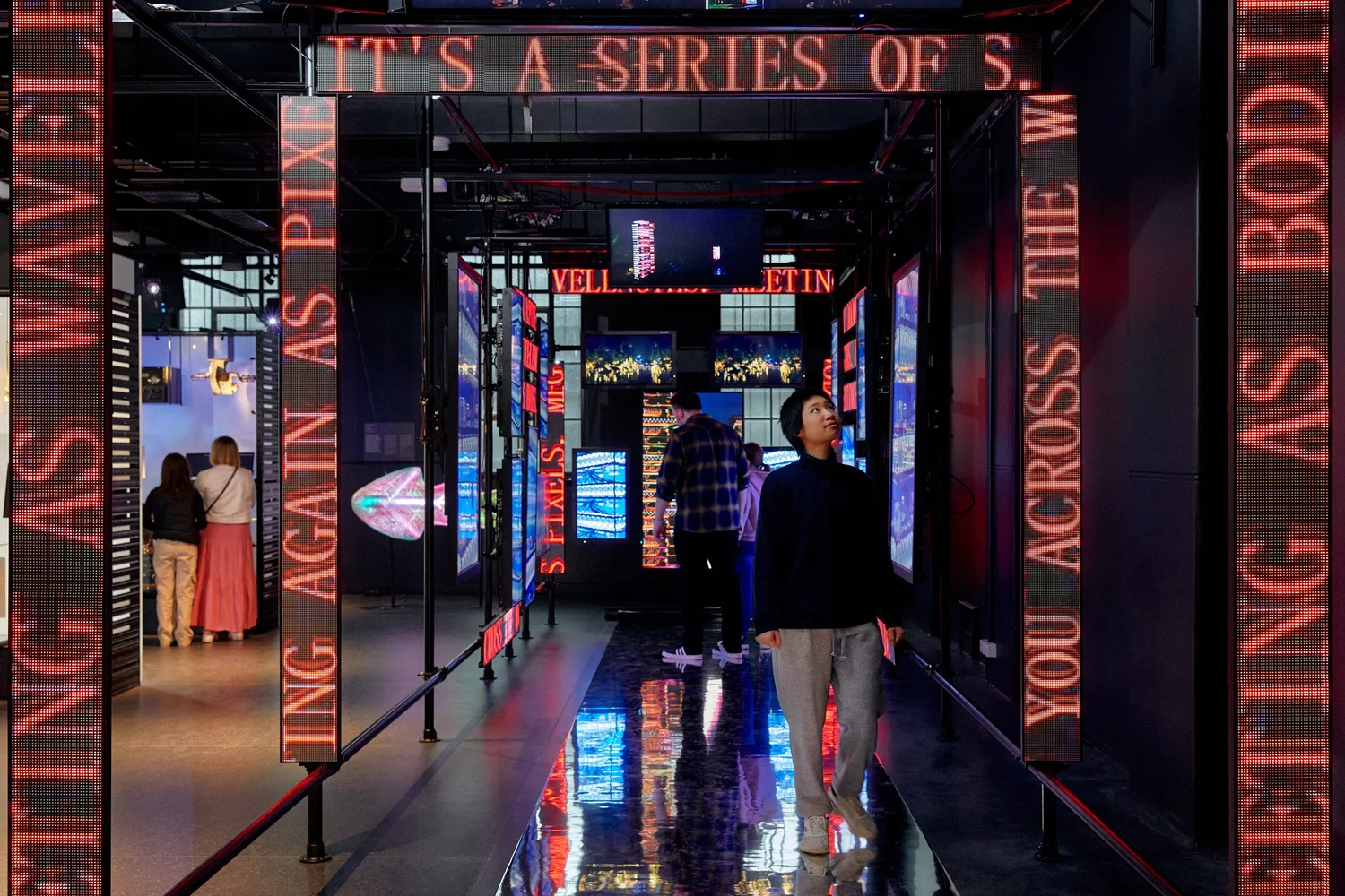 National Communication Museum — immersive pixel-text corridor (photo Casey Horsfield / Studio Peter King)